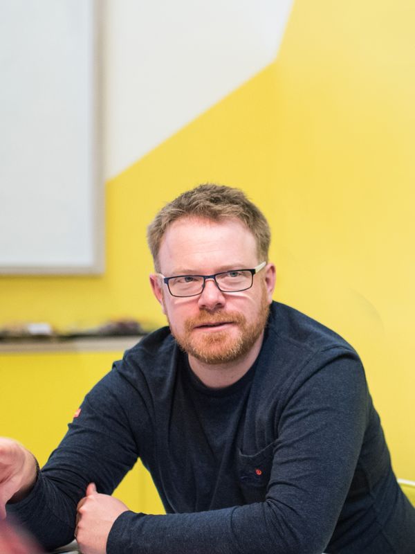 Matt Chick at a table in the Chick office in Colchester